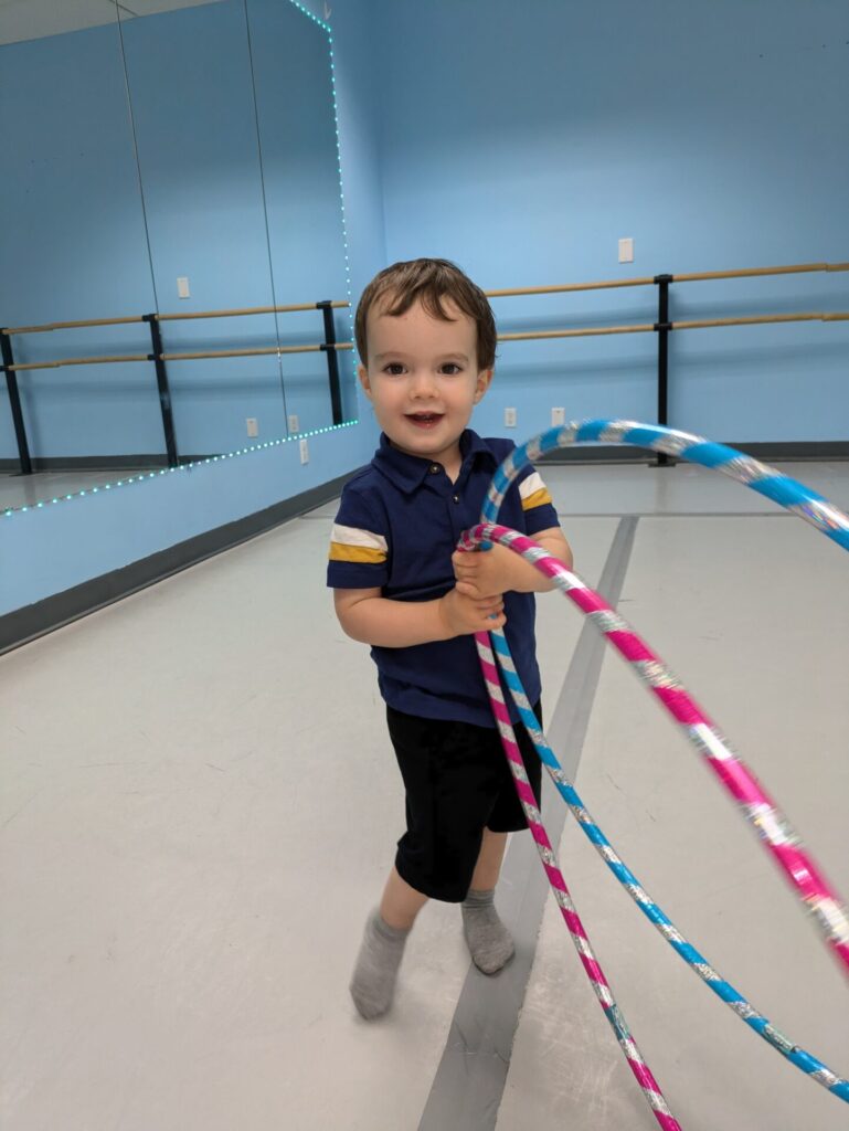 Toddler Dancing with Hoops